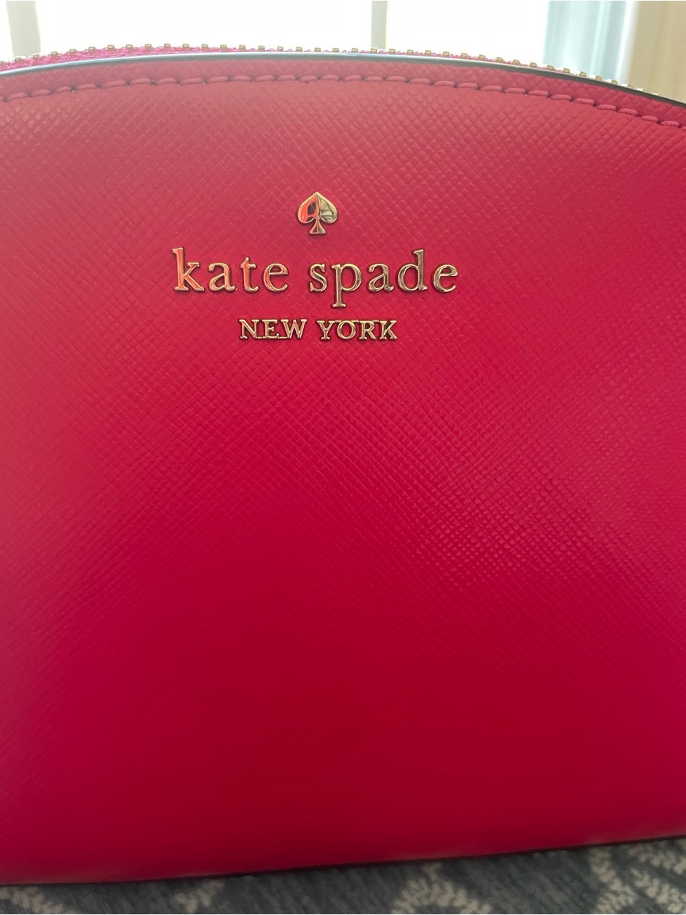 kate spade bright pink logo interior patch
